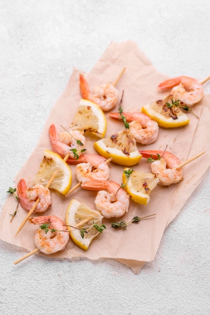 Seafood shrimp skewers on baking paper