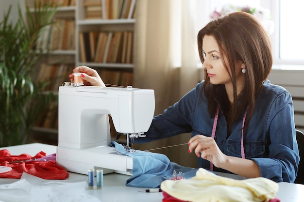 Free photo seamstress working at home