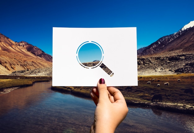 Free Photo searching discovery perforated paper magnifying glass