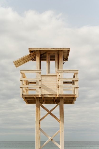 Seaside view with lifeguard tower low angle