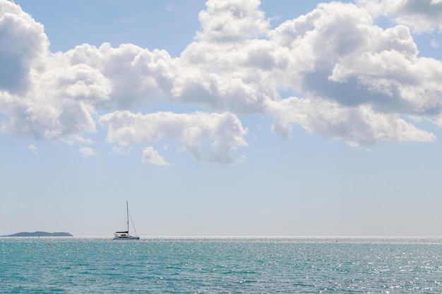 Free Photo seaside view with mountains in the distance and boats