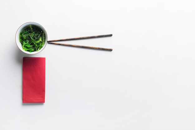 Seaweed salad and chopsticks