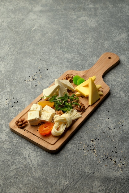 Free photo selection of cheese served on desk