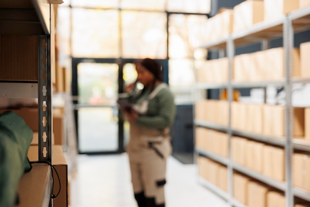 Free Photo selective focus of shelves full with boxes ready for delivery