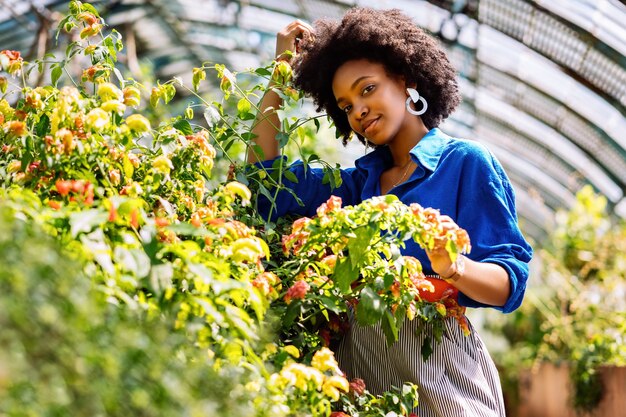 Selective focus shot of an African American female in the garden