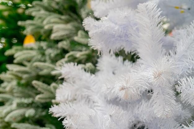 Free Photo selective focus shot of christmas trees in a store