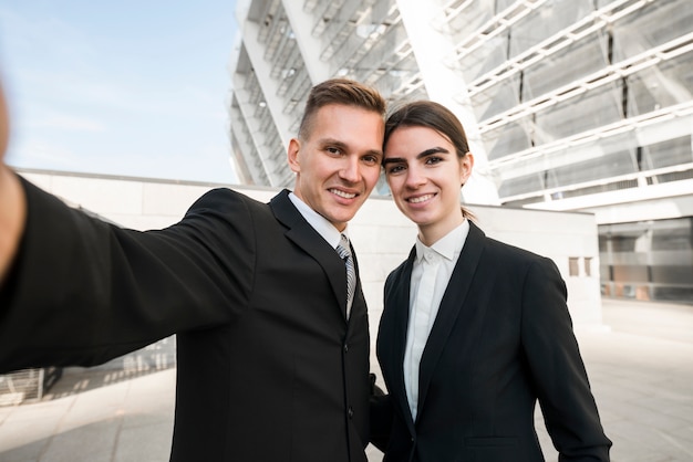 Free photo selfie of business couple