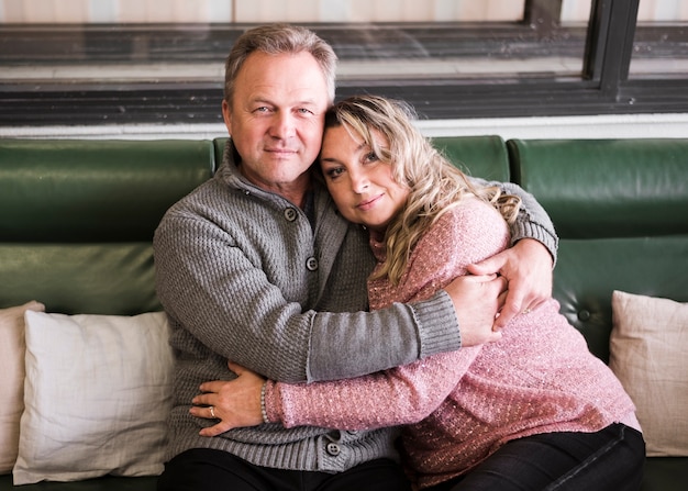 Free photo senior couple embracing each other