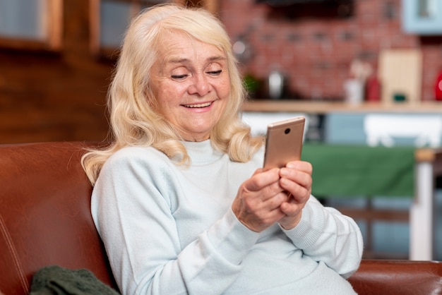 Senior female looking at phone