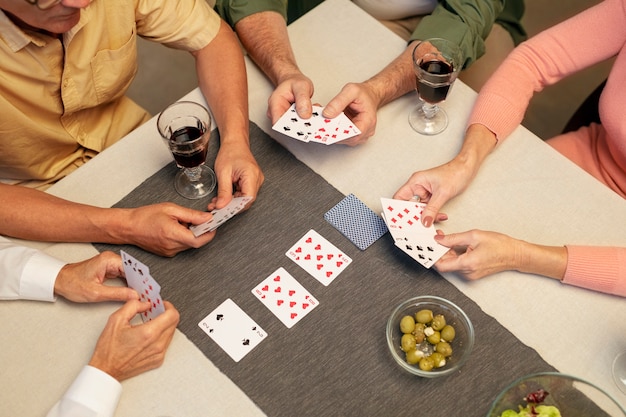 Senior friends having a party at night