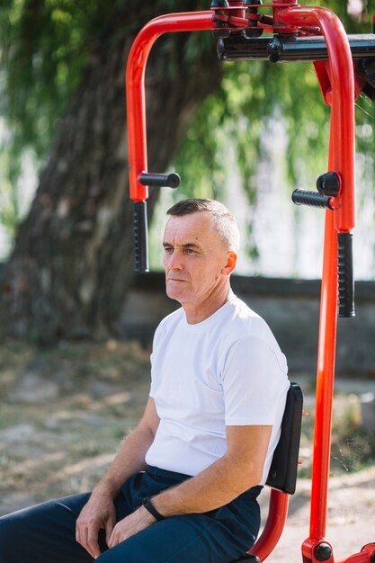 Senior man resting after training