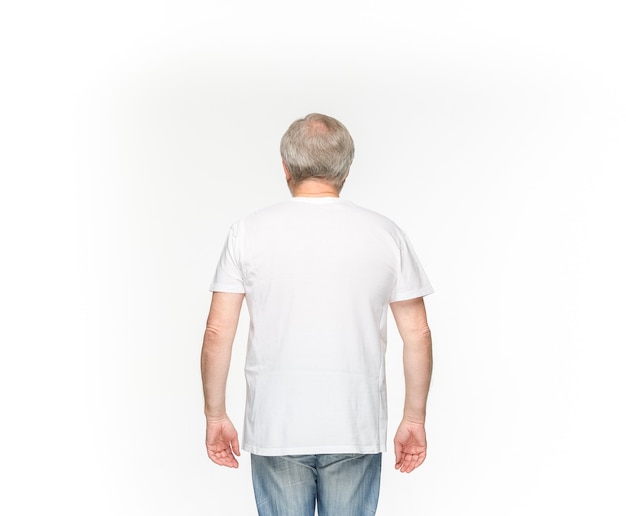 Free photo senior man's body in empty brown t-shirt isolated on white.