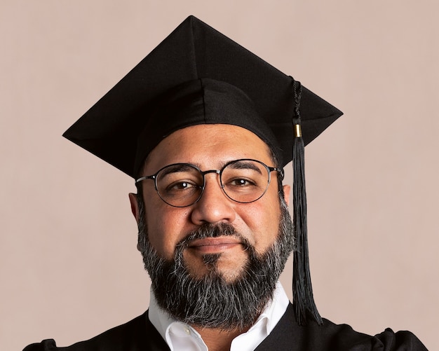 Free photo senior man wearing regalia, smiling face portrait