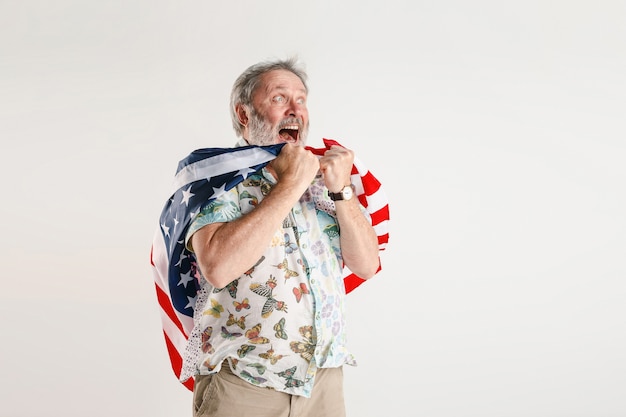 Senior man with the flag of United States of America