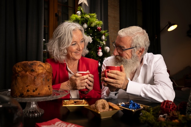 Senior man and woman celebrating christmas