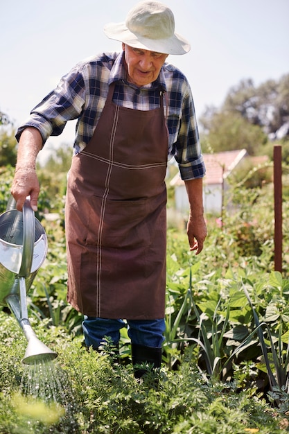 Free photo senior man working in the field