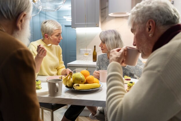 Senior people celebrating together