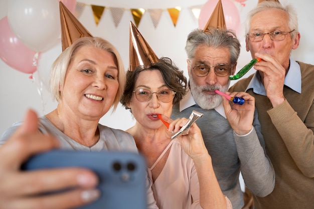 Senior people having fun at party