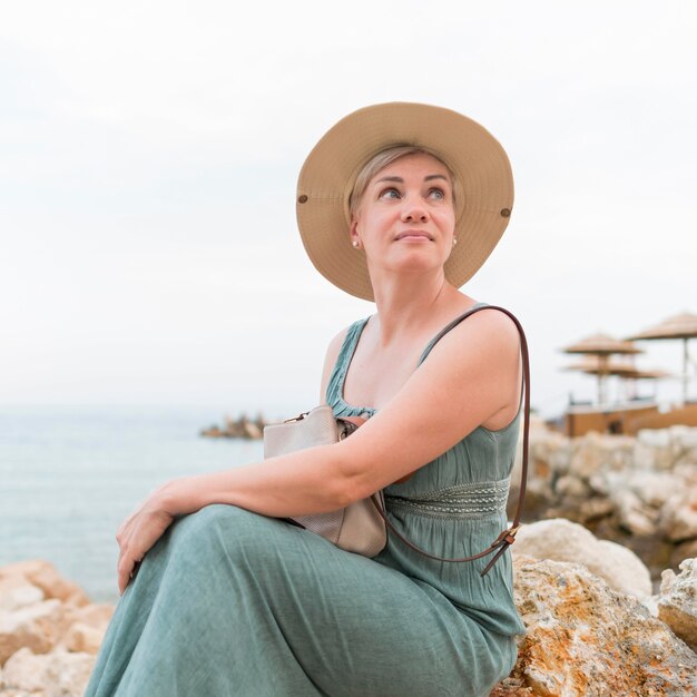 Senior tourist woman with hat