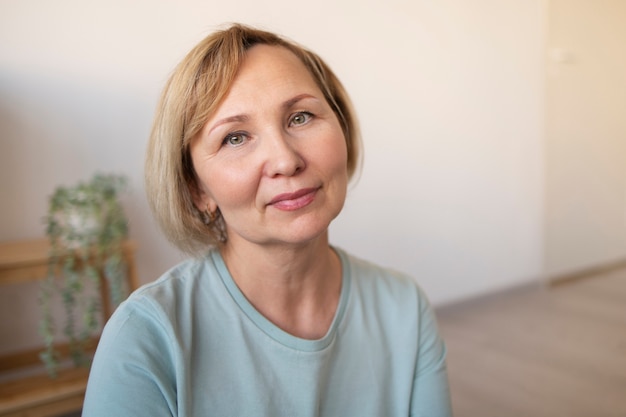 Senior woman doing exercises at home