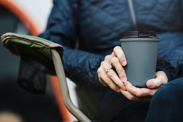 Free photo senior woman holding reusable cup