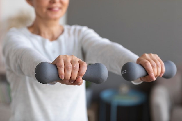 Senior woman training at home