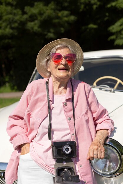 Senior woman traveling alone and having fun