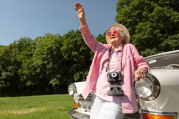 Senior woman traveling alone and having fun