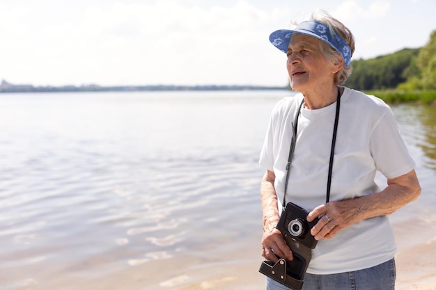 Senior woman traveling alone in the summer