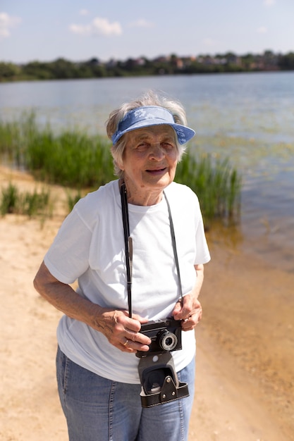 Senior woman traveling alone in the summer