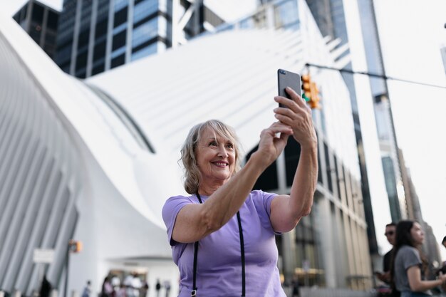 Senior woman traveling areound the world