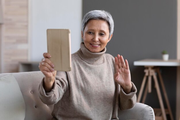 Senior woman video conferencing