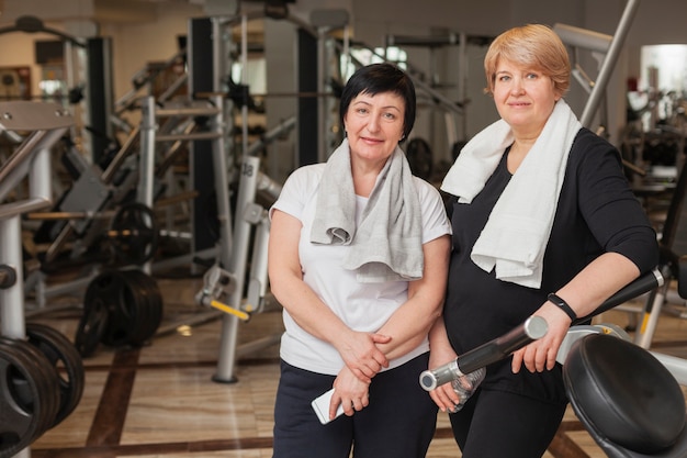 Senior women at gym resting