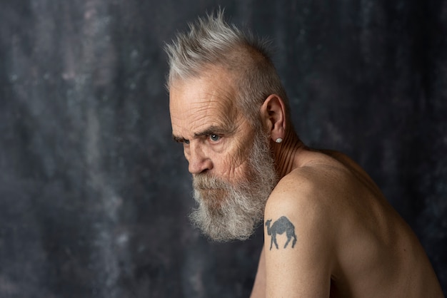 Sensitive old man portrait in studio