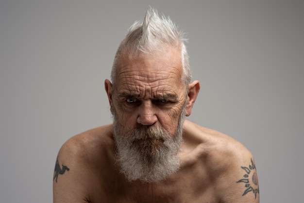 Sensitive old man portrait in studio