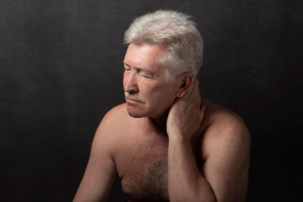 Sensitive old man portrait in studio