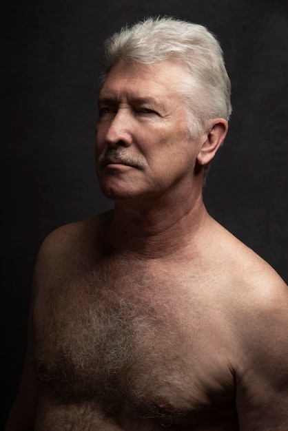 Sensitive old man portrait in studio