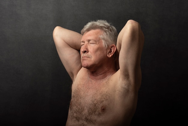 Sensitive old man portrait in studio