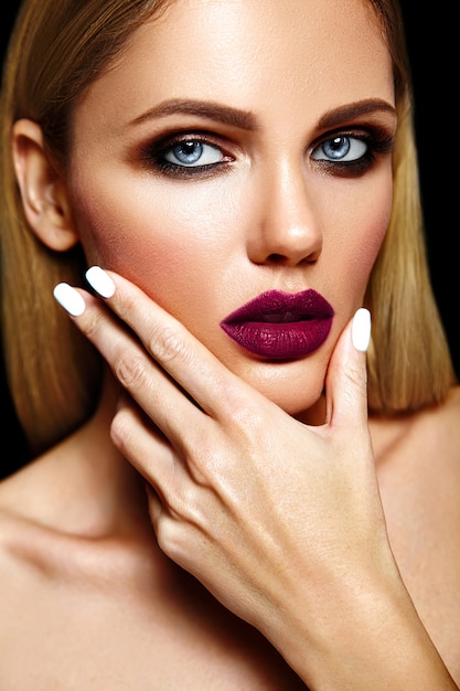 sensual glamour portrait of beautiful blond woman model lady with fresh daily makeup with purple lips color and clean healthy skin