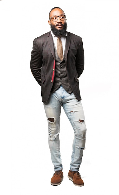 Serious man in suit and jeans