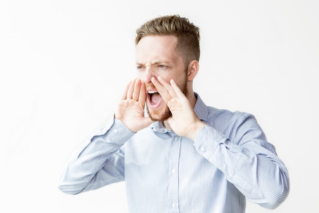 Serious Young Attractive Man Shouting Loud