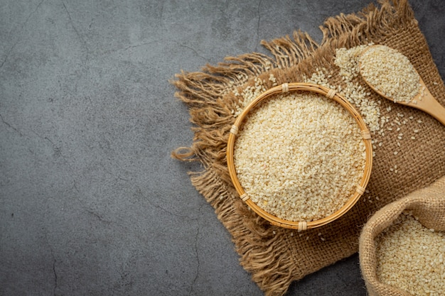 Sesame seeds on dark background