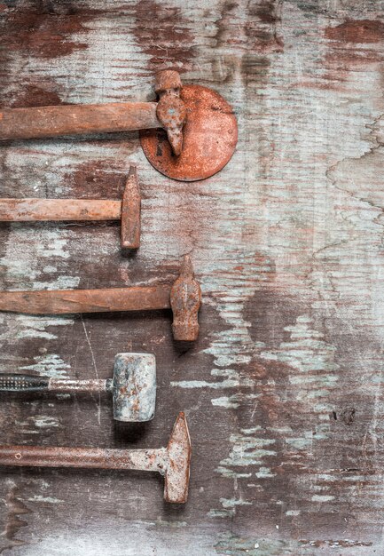 The set of construction tools on wooden table