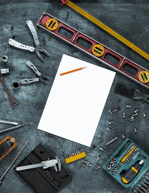 Set of construction tools on wooden table