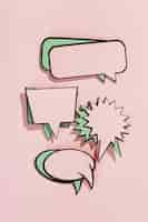 Free photo set of empty comic speech bubbles on pink backdrop