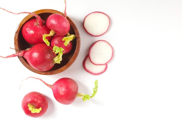 Free Photo set of fresh whole small garden radish isolated on white surface cutout. top view. flat lay. freshly picked from home growth organic garden. food concept.