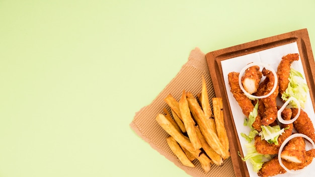 Free Photo set of fried snacks on wooden board