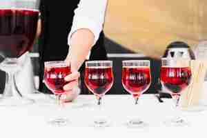 Free photo set of glasses with alcohol on a table