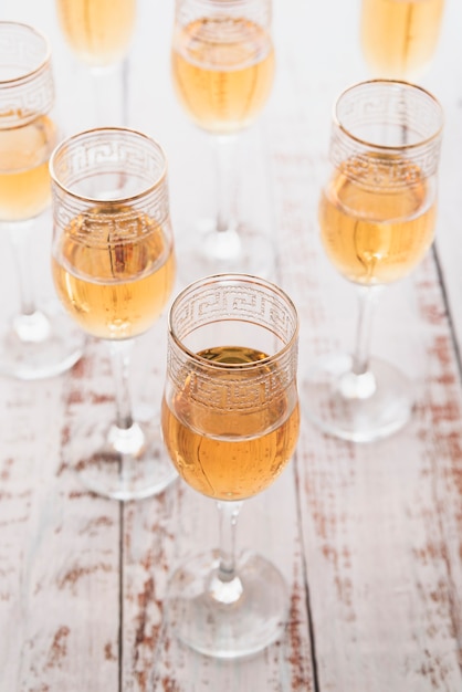 Set of glasses with champagne on the table