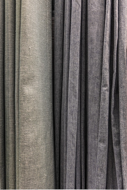 Free photo set of grey dense fabrics of uniform texture, choice of materials in grey colors.